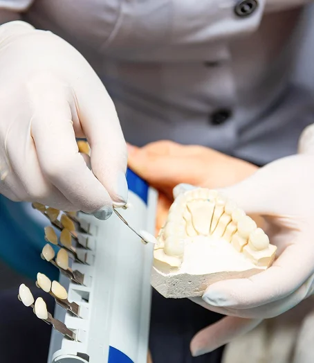 Dentist matching crown shade using a porcelain color guide